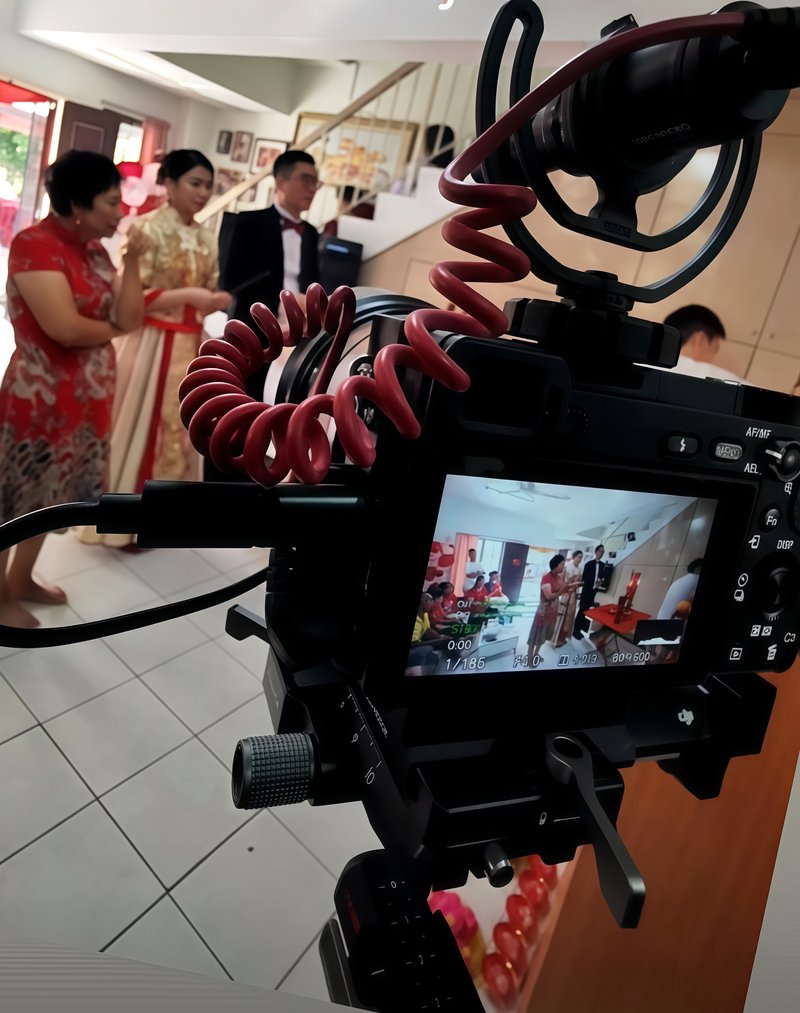 Camera rig covering a traditional wedding ceremony, the live view on its screen