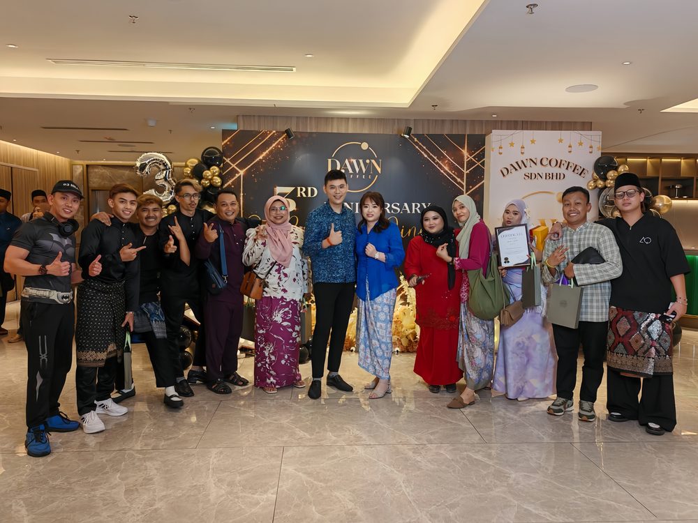 Group photo at a corporate third-anniversary celebration