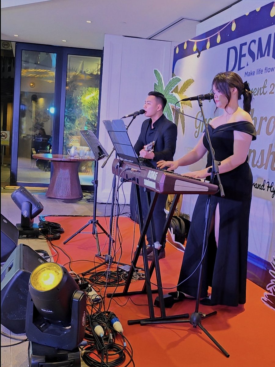 Vocalist and keyboard duo at a corporate launch