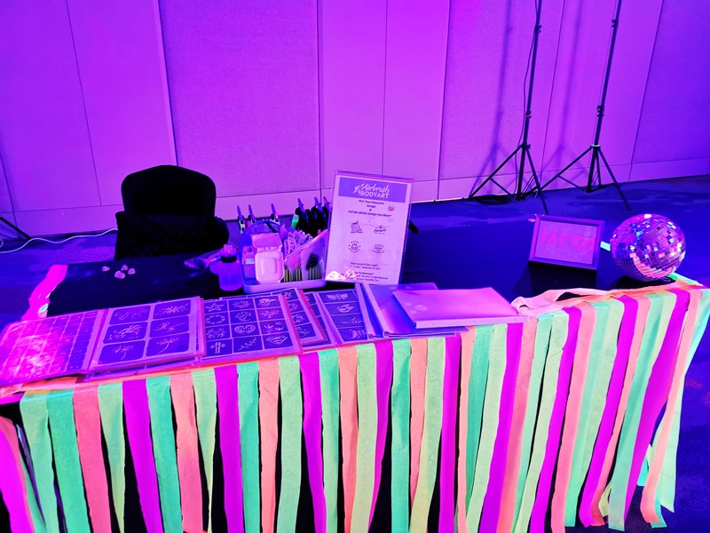 Airbrush tattoo station set up for guests