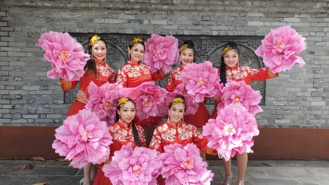 Fan dance in pink peony costumes