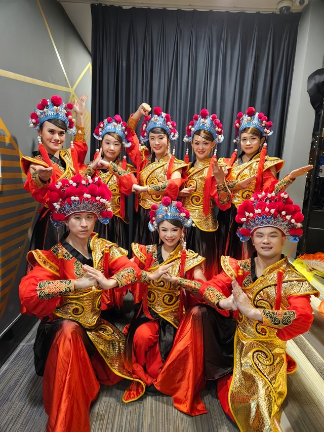Chinese opera troupe in full headdress and gold robes