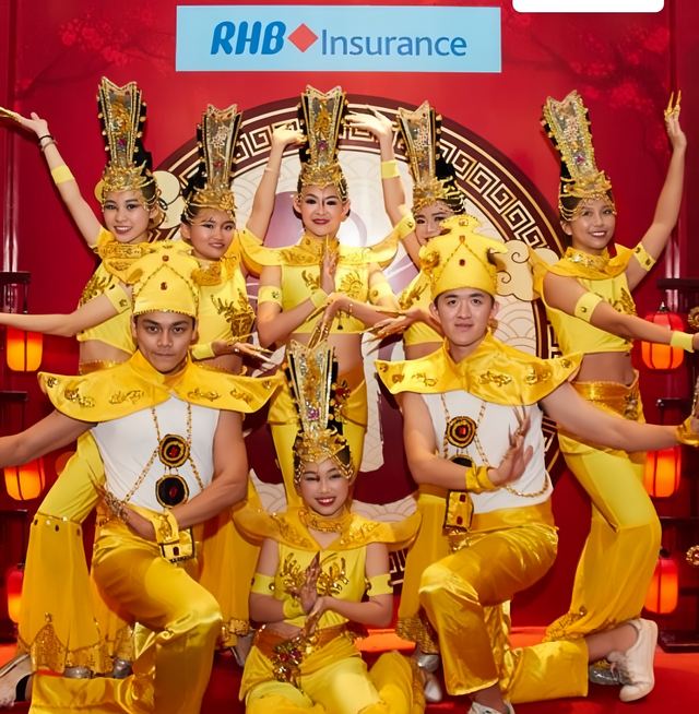 Gold armour costume routine at a corporate stage