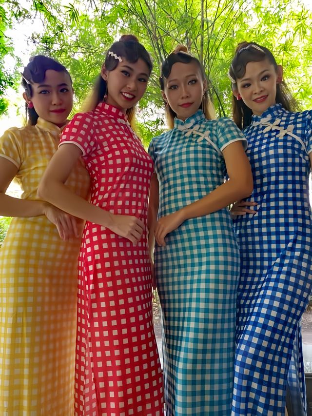 Dancers in checked cheongsam