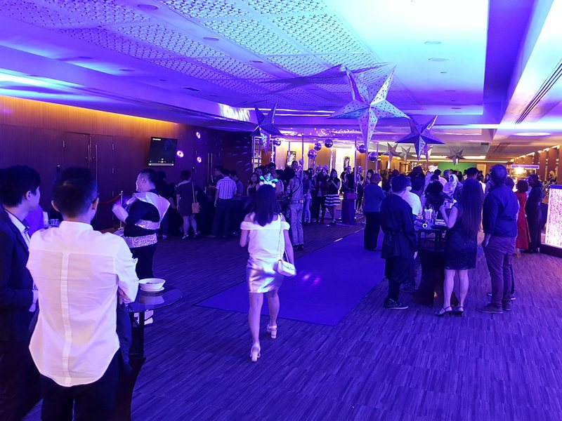 Guests arriving through the themed registration foyer