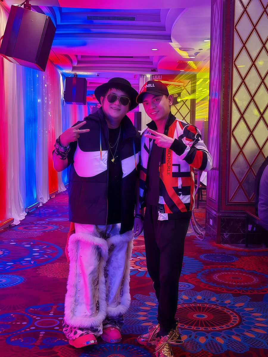 Emcee and DJ between segments at a ballroom event