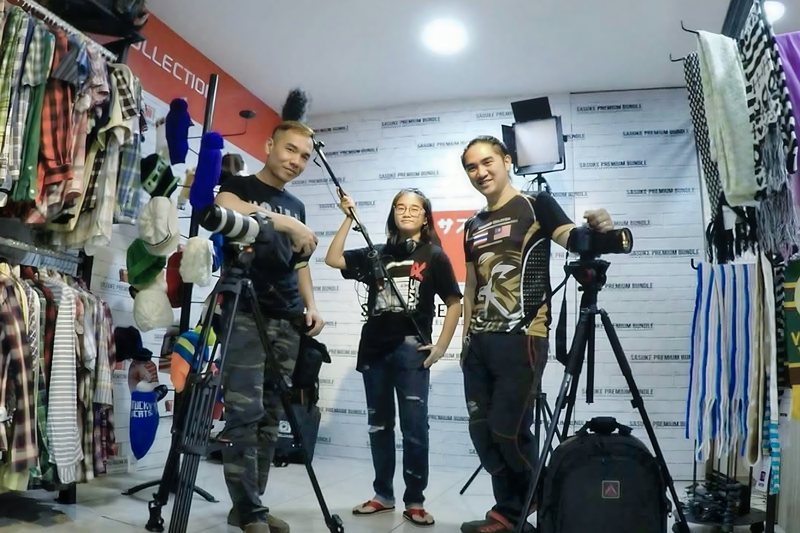 Event Foo crew shooting on location with tripods and lighting
